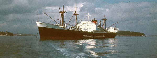 Cardiff City loading at anchor.