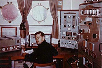 R/O Dick Gibbons at his desk