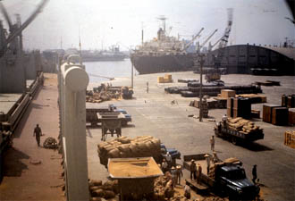 Showing quayside with cargo of soya beans being discharged