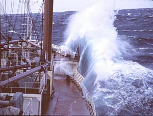 Waves breaking over the bow