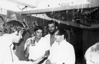 Four officers in ship's bar