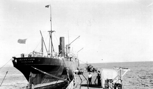 Devon City alongside