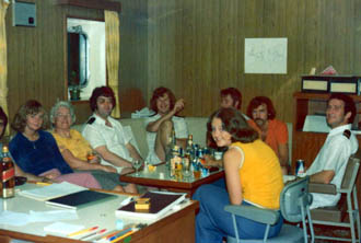 Officers and wives having a drink
