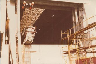 The engine just exits the building