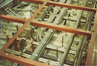 Cables under floor plates