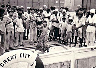 Girl dancing on the quay