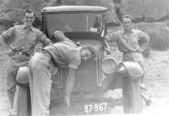 Three officers on the beach