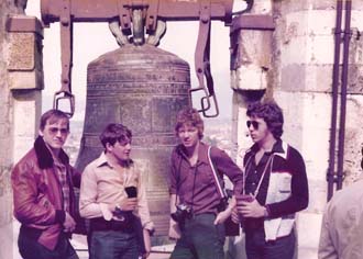 Four cadets in front of bell on Tower of Pisa