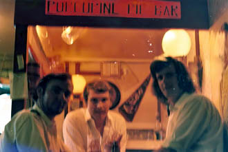 3 officers in front of bar