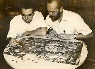 Two officers with jig-saw puzzle