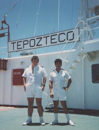 Two officers on the bridge wing